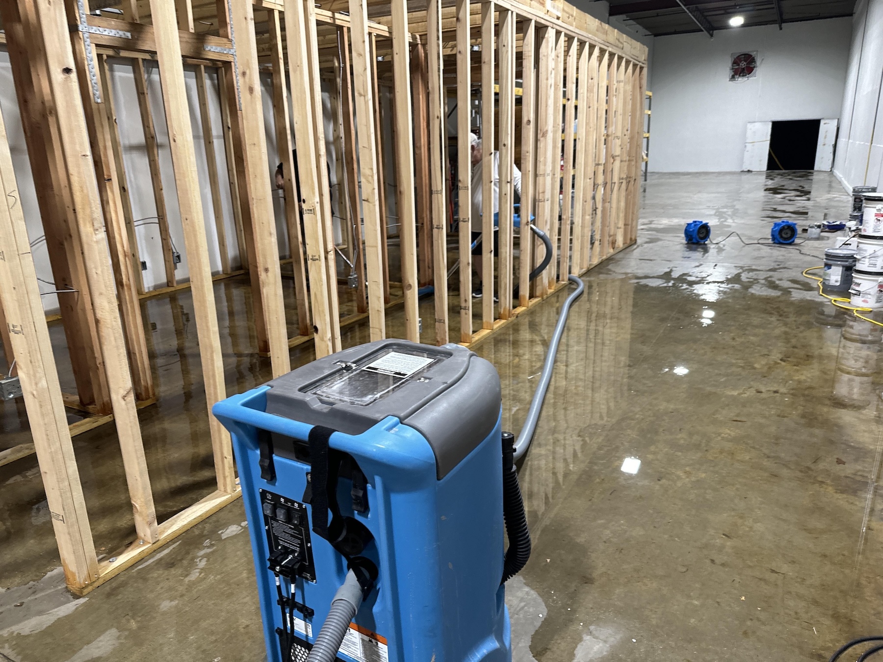 Commercial framing exposed and saturated after storm intrusion in Steubenville