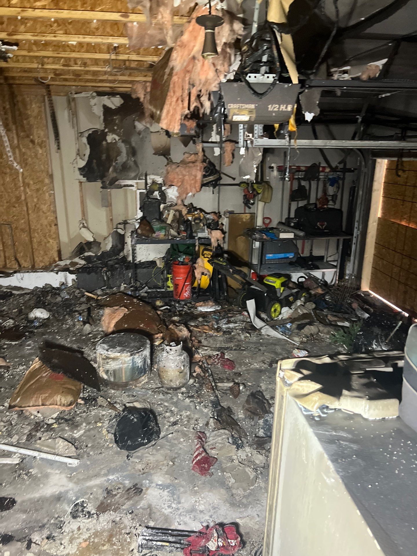 Extensive fire damage inside a Steubenville garage cleared by IRS crew