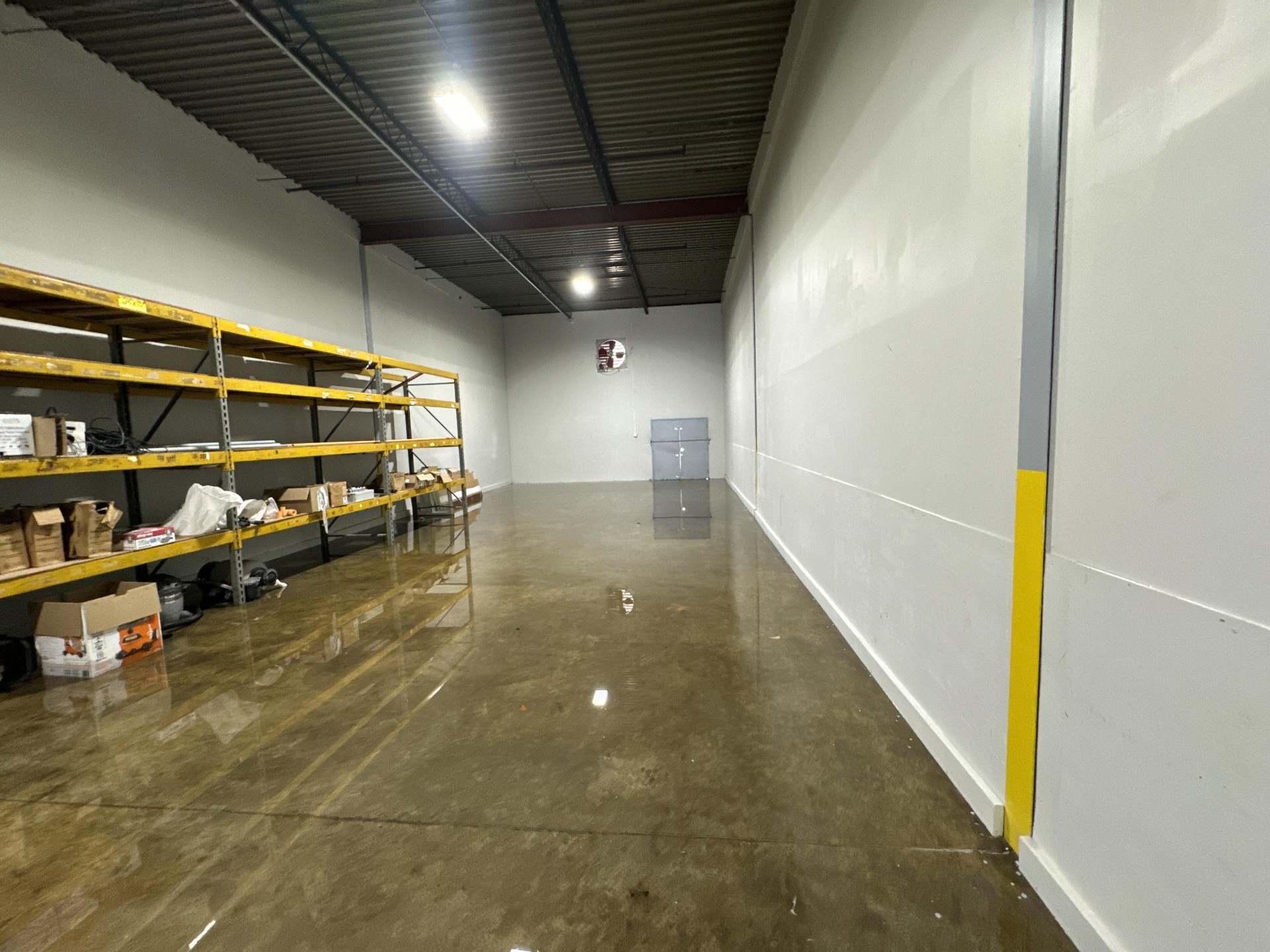 Warehouse shelves flooded after a storm event in Steubenville